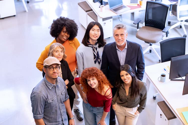 Happy entrepreneurs working together in a bright office